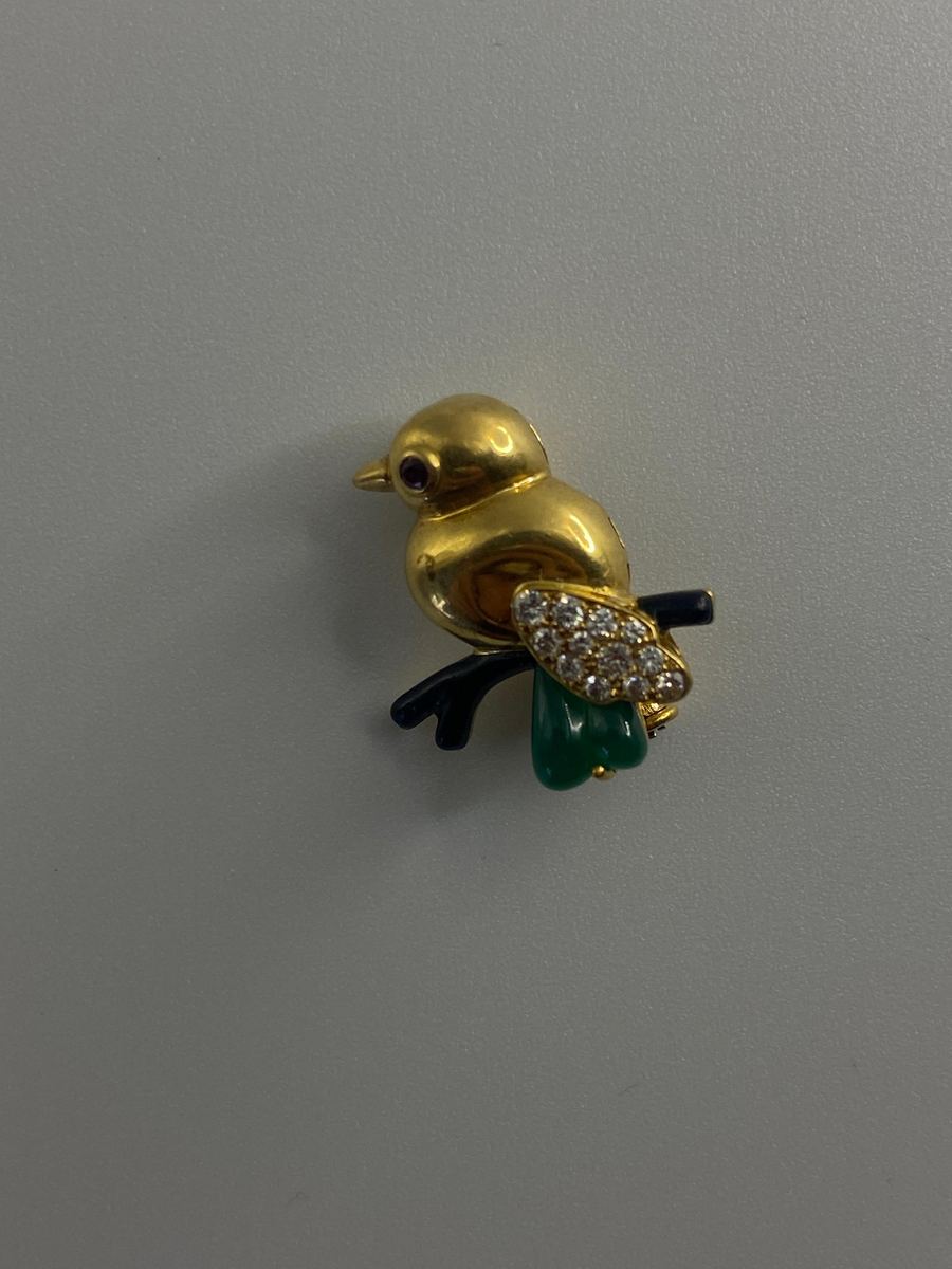 Broche pájaro Terry's Oro